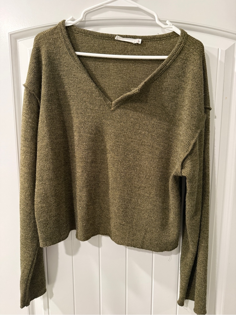 Green V-neck cropped sweater